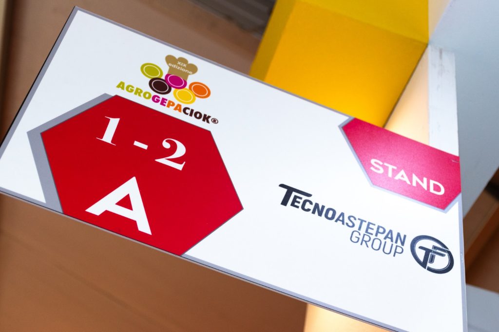 Il cartellino dello stand 1-2 A di Agro.Ge.Pa.Ciok con il logo Tecnoastepan Group